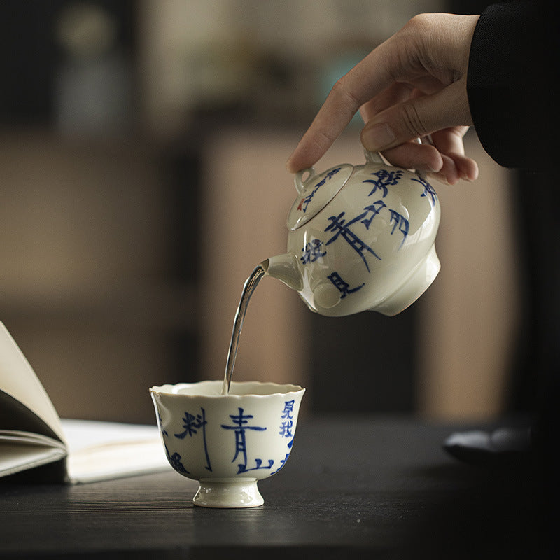 Mystery Blue | Handwritten 'I see many charming green mountains' | Smiling Tea Pot