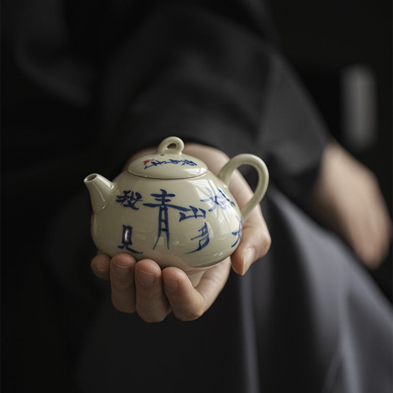 Mystery Blue | Handwritten 'I see many charming green mountains' | Smiling Tea Pot