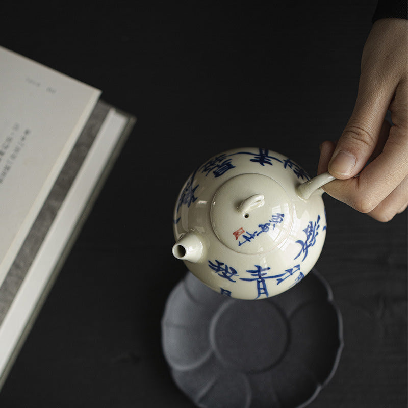 Mystery Blue | Handwritten 'I see many charming green mountains' | Smiling Tea Pot