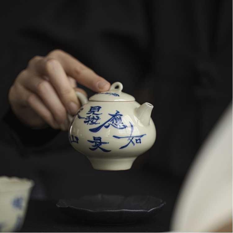 Mystery Blue | Handwritten 'I see many charming green mountains' | Smiling Tea Pot